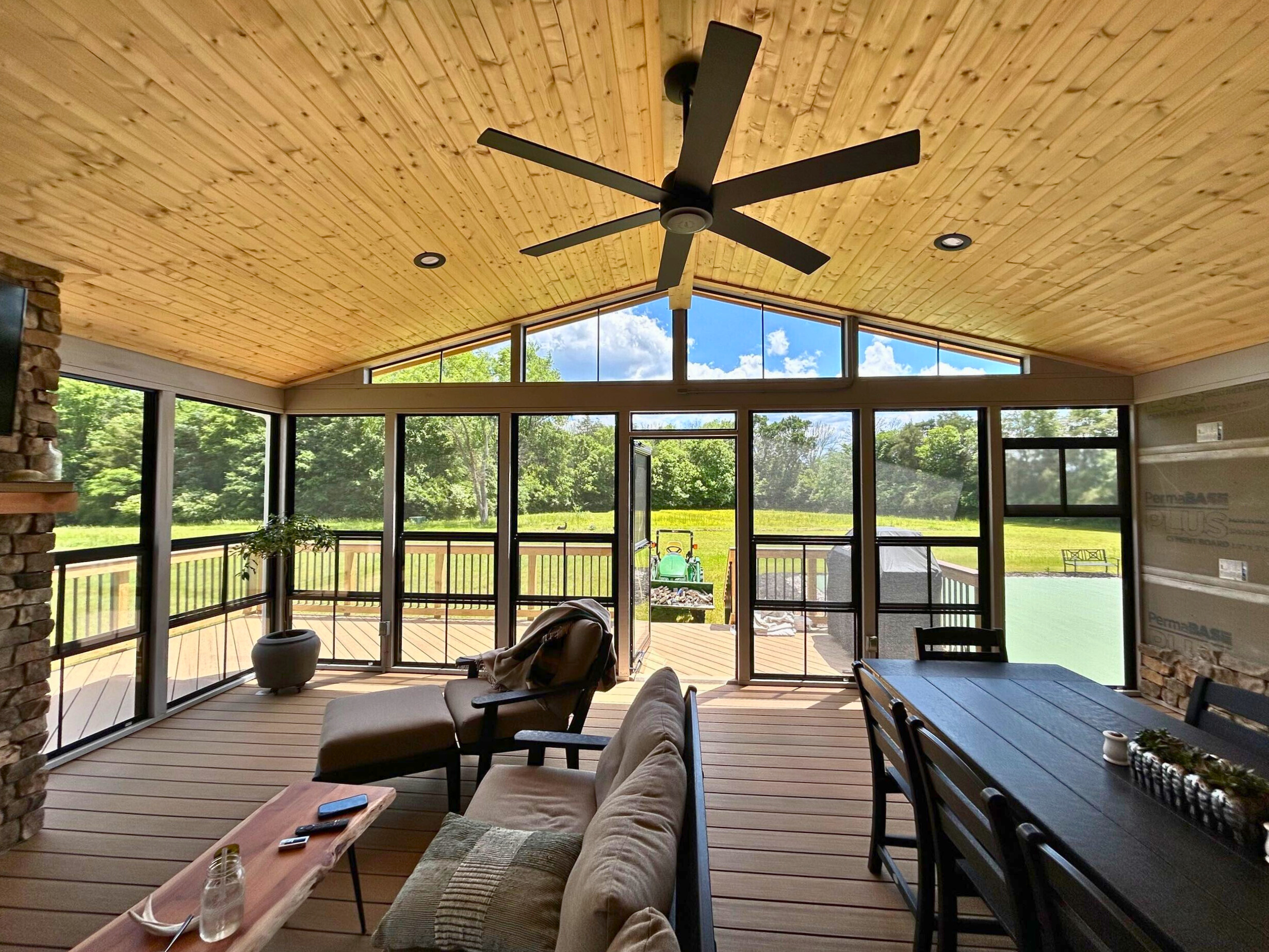 Custom 3-seaon room with Eze-breeze 4-track windows.